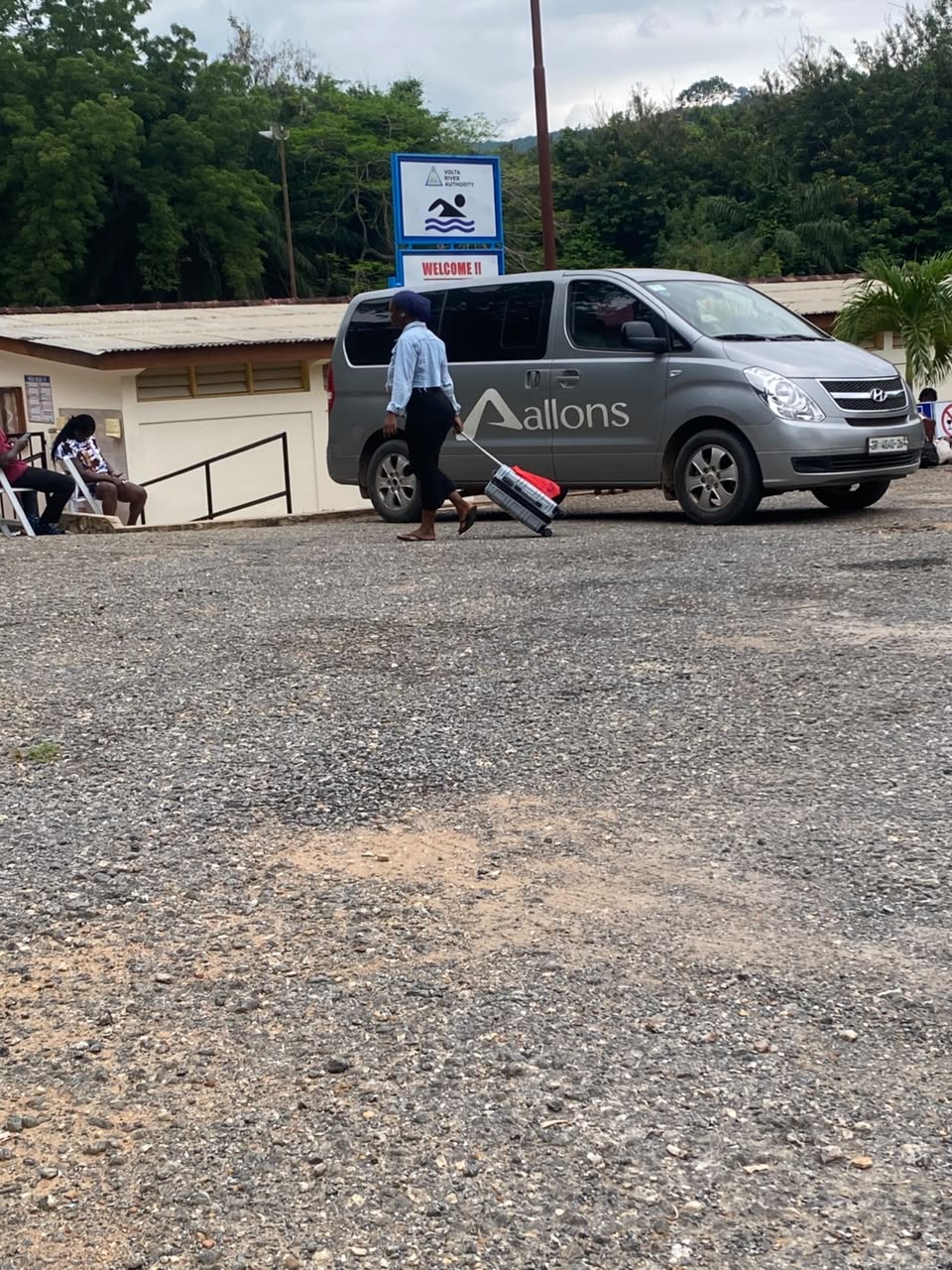 Allons van at a transfer point with luggage