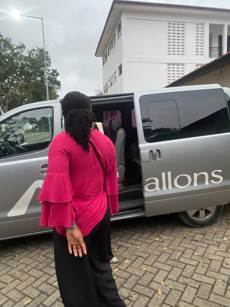 Guest boarding an Allons van